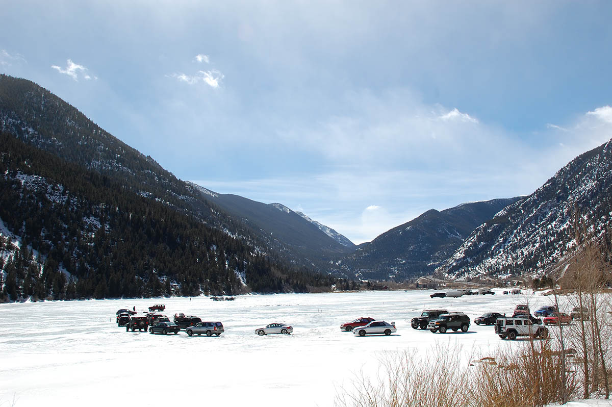 Cars line up on a frozen georgetown lake in anticipation of the start of an Ice Race.