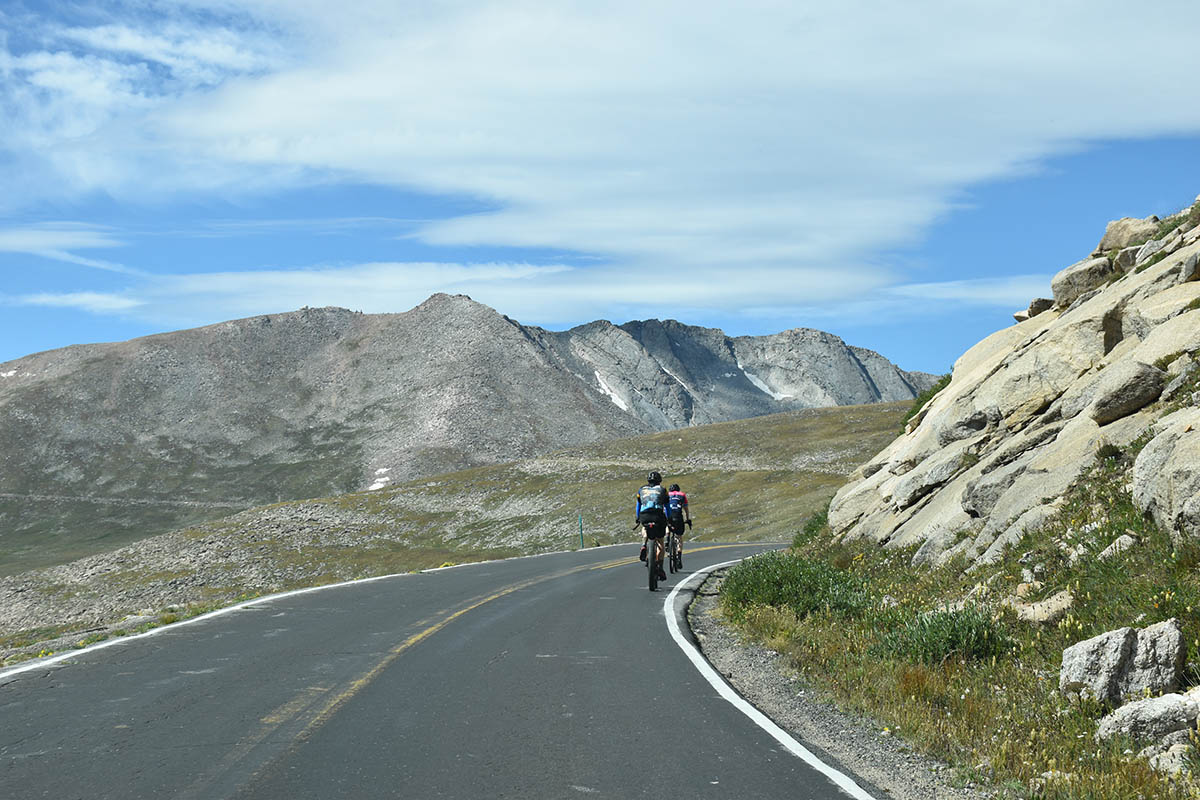 Two bikers take a challenging-but-exhilarating ride up the Mount Evans Scenic Byway, the highest paved road in North America.